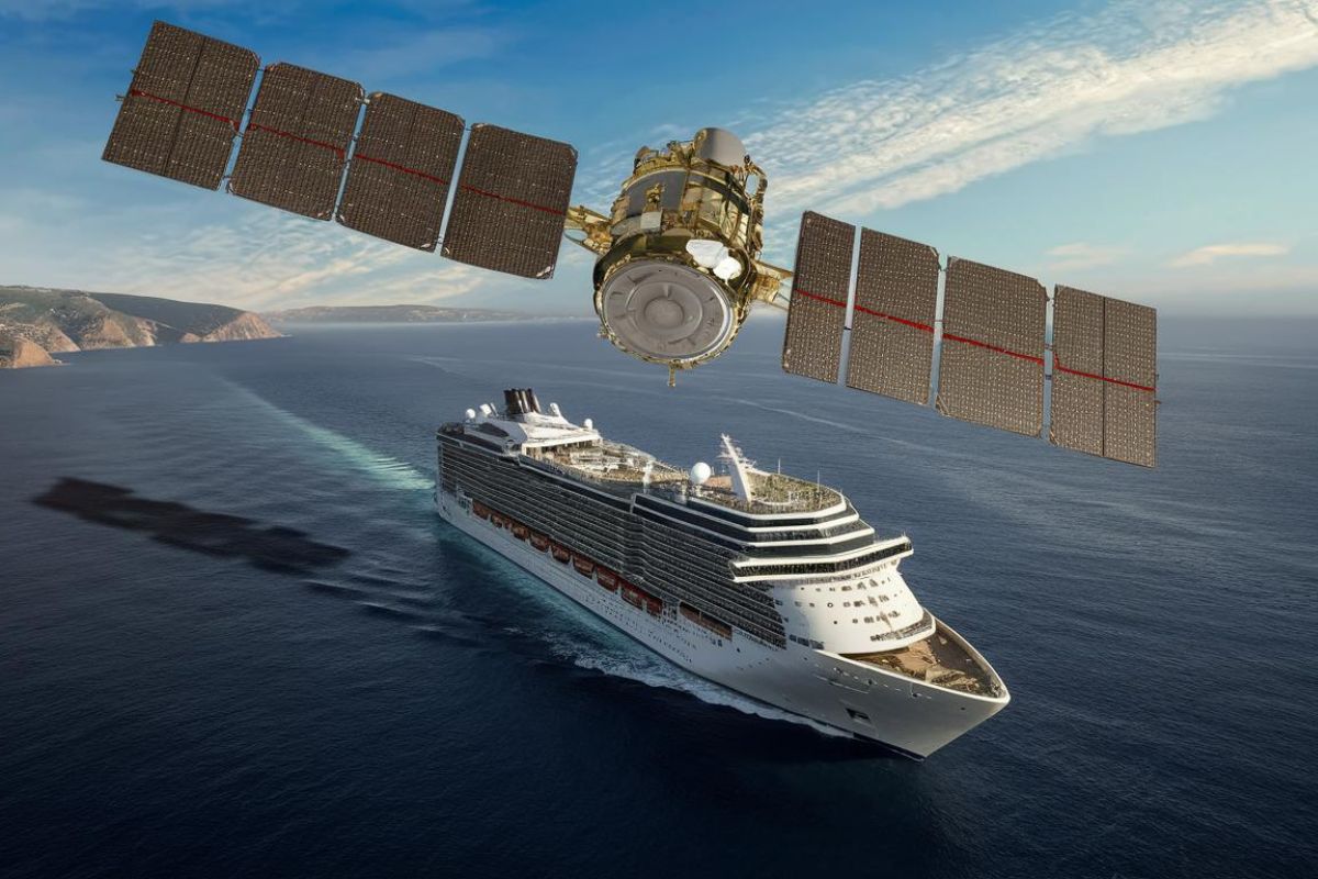 satellite orbiting Earth over a cruise ship