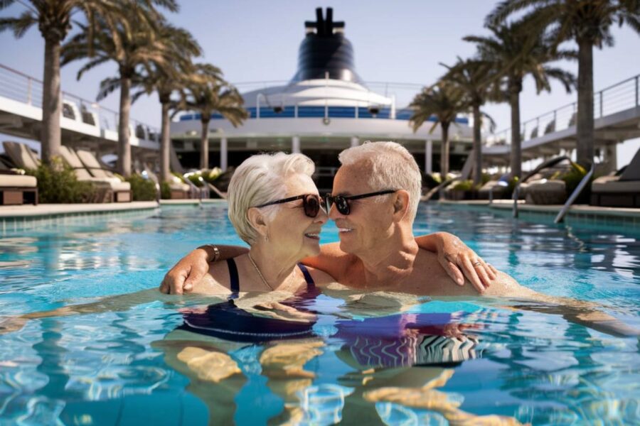 older couple in a swimming pool on a luxury Crystal cruise ship