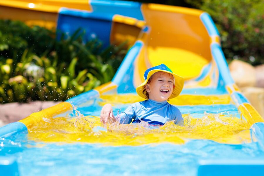 Kid on a water slide on a Cruise ship