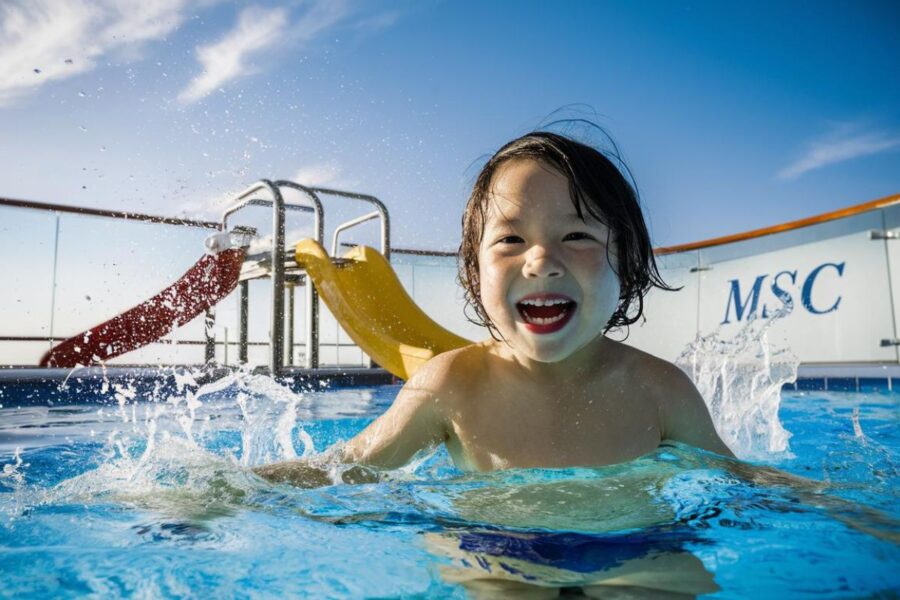 Little boy in the swimming pool Water Park on MSC cruise ship