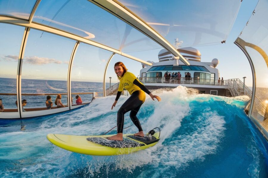 one person surfing on a FlowRider surf simulator on Allure of the Seas