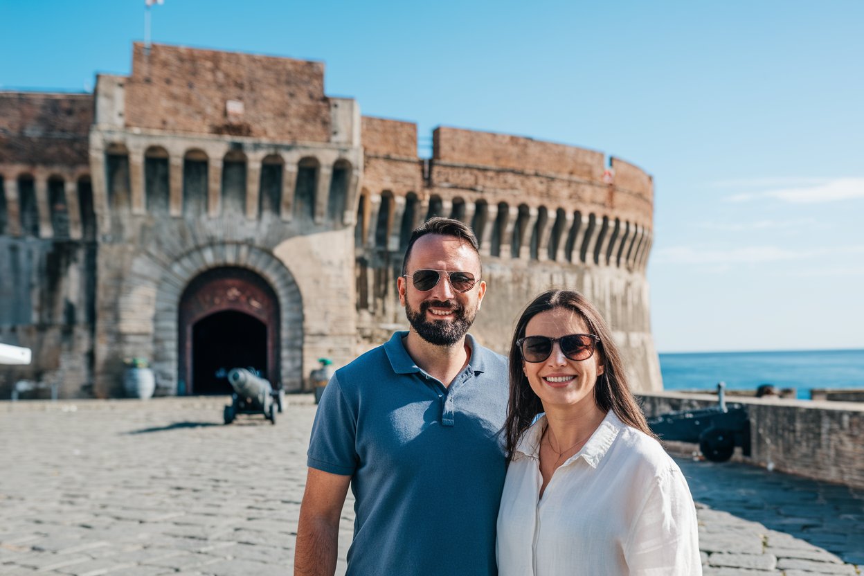 2 people in front of Forte Michelangelo 16th-century fortress in Civitavecchia