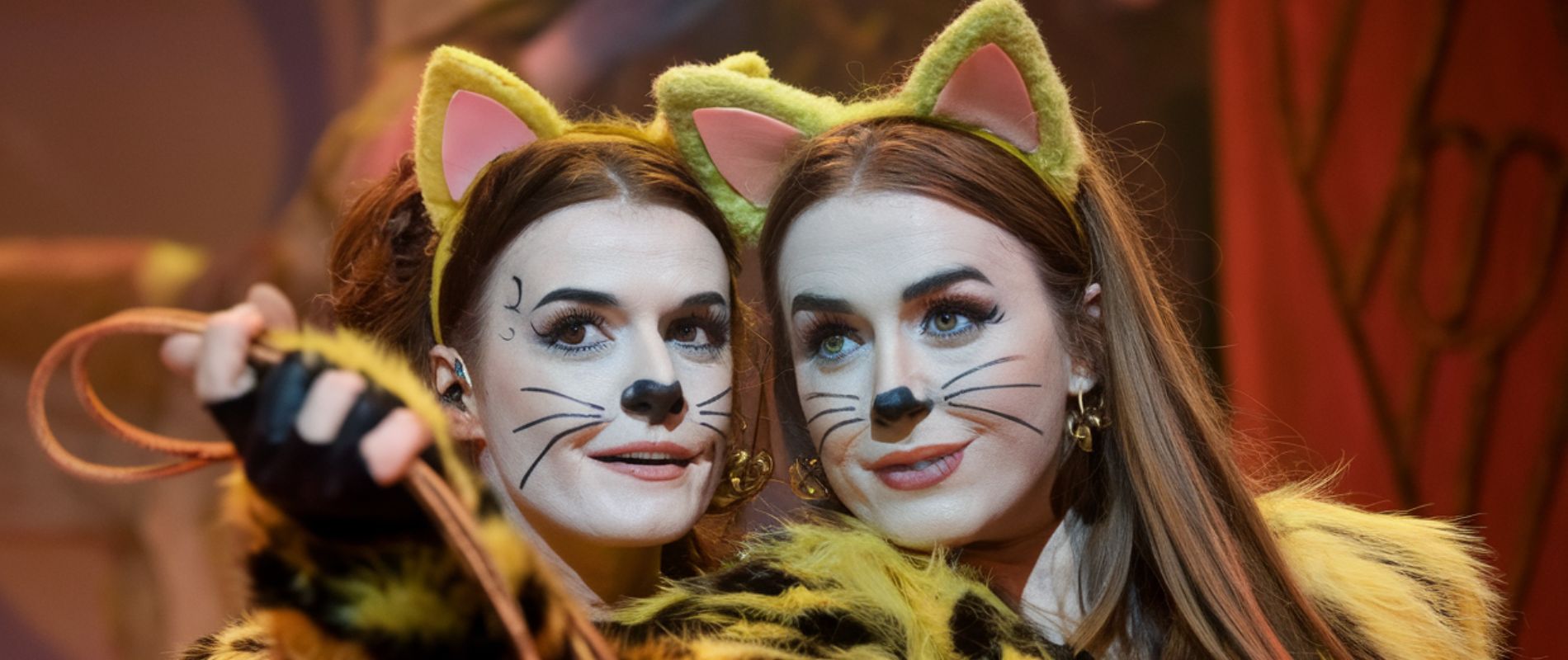 2 performers in a Cats musical on a cruise ship