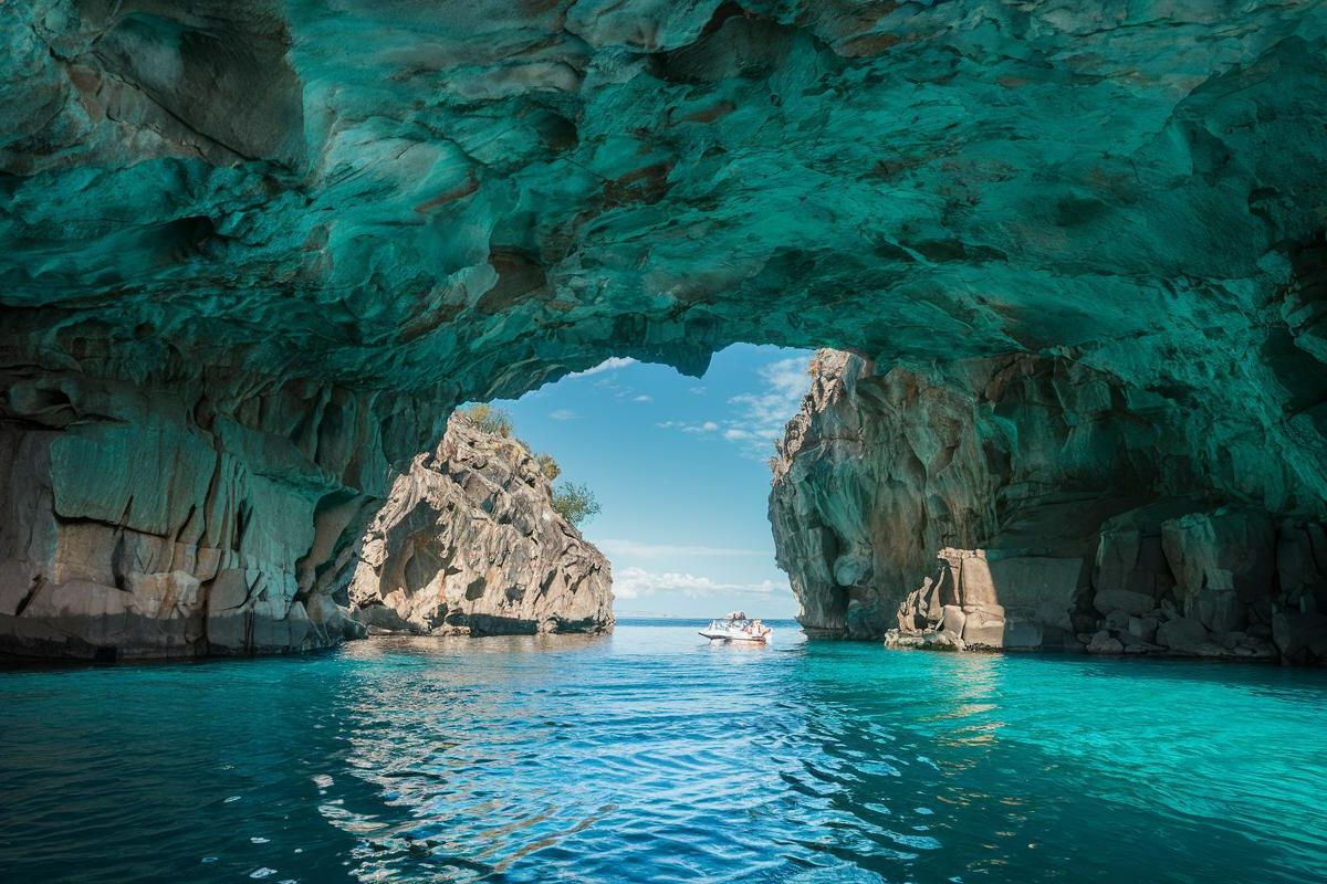 Explore Melissani Cave cave.Kefalonia, Greece.