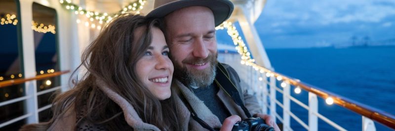 Couple enjoying a Christmas and new year cruise