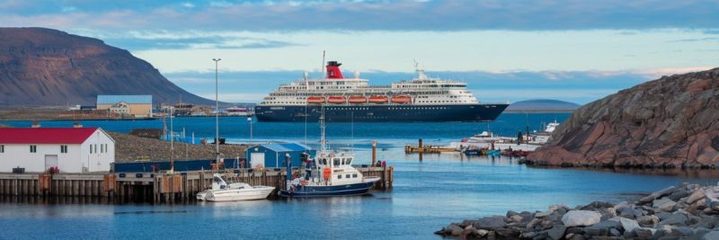 Qaqortoq, Greenland port with cruise ship on the background