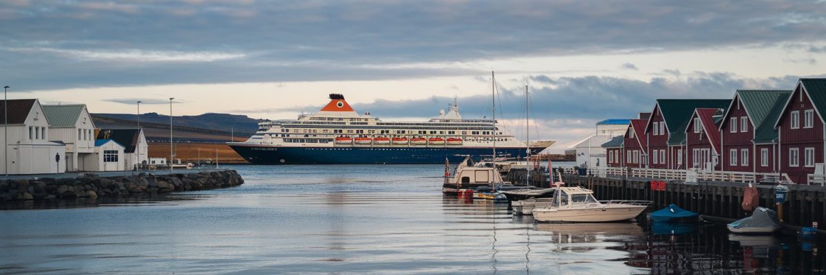 Cruise port of Akureyri, Iceland with cruise ship on the background