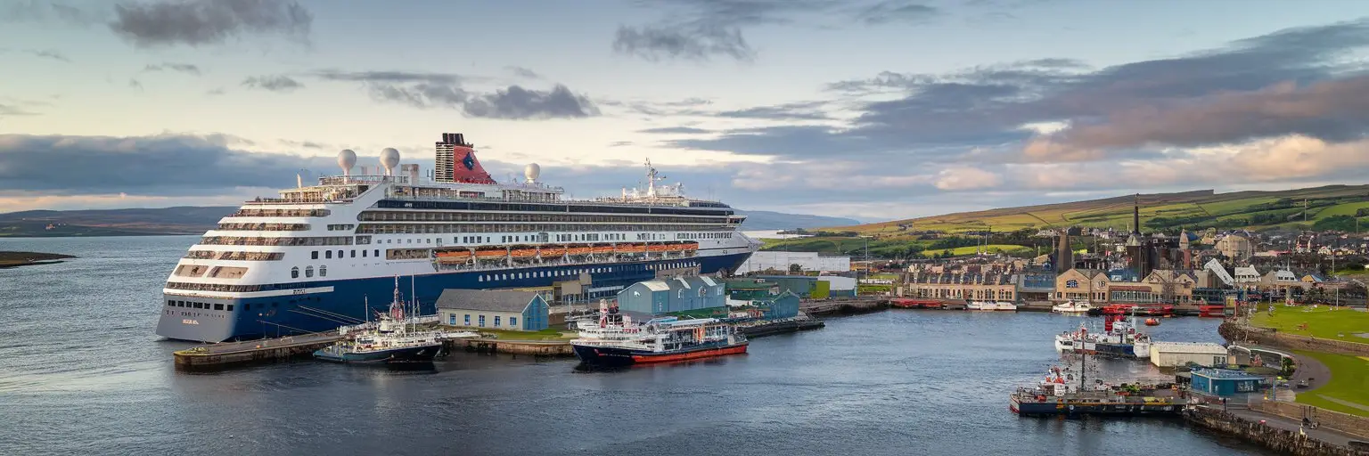 Kirkwall, Scotland cruise port with cruise ship on the background