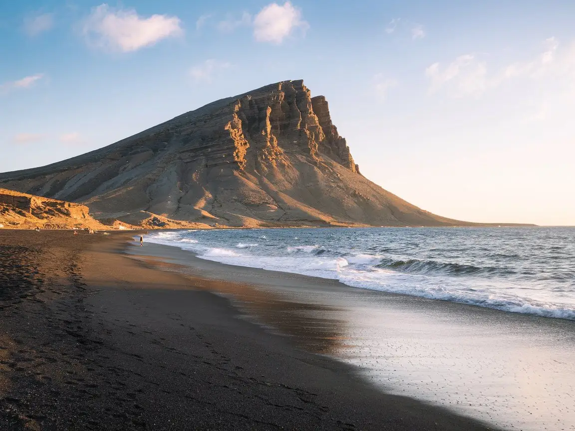 Perissa's black sand beach presents a unique photo opportunity in Santorini