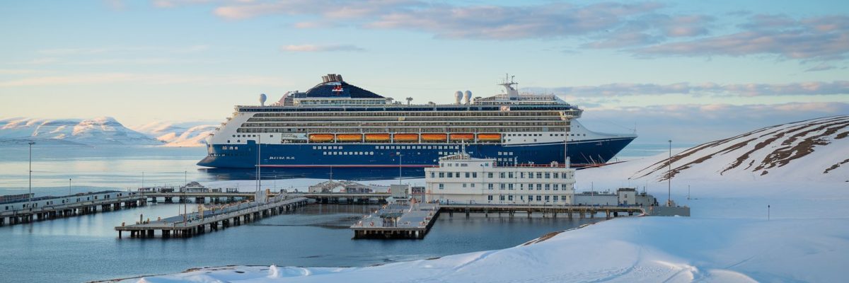 Somerset Island, Canada Cruise port with cruise ship on the background