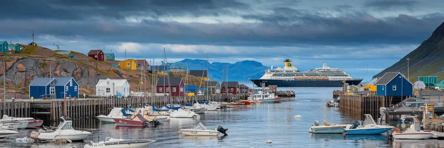 Uummannaq, Greenland port with cruise ship on the background