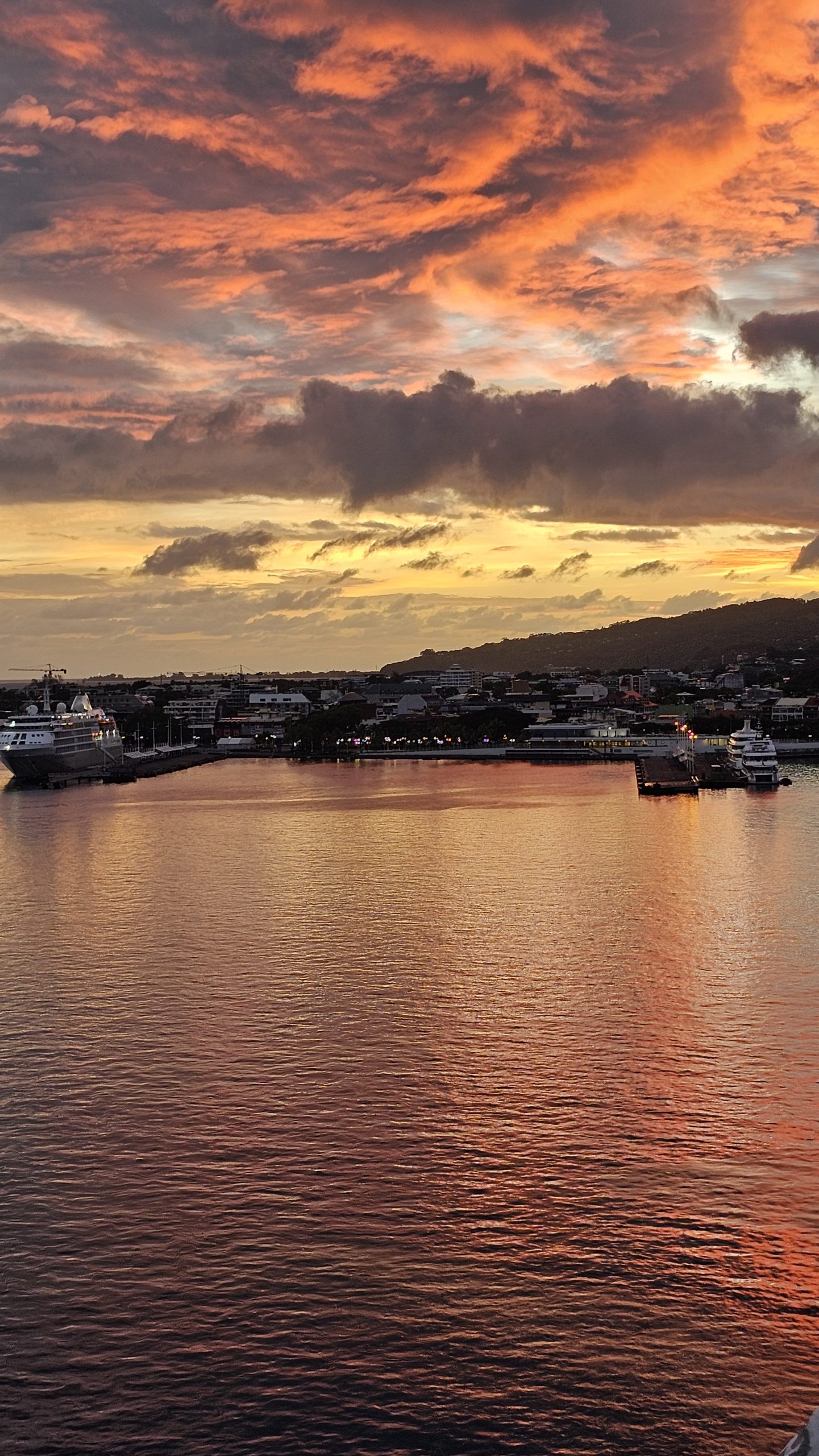 Cruise Ship coming into Papeete cruise port at sunrise