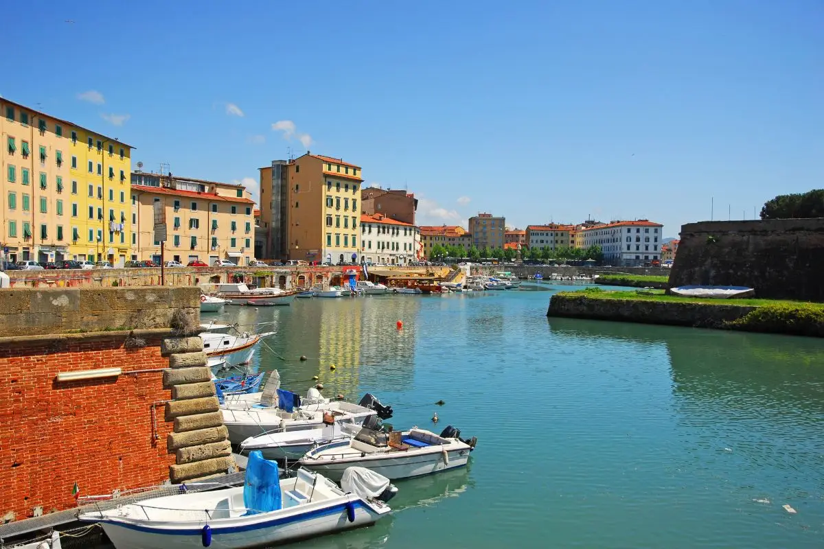 Downtown Livorno with boats at Venice district.