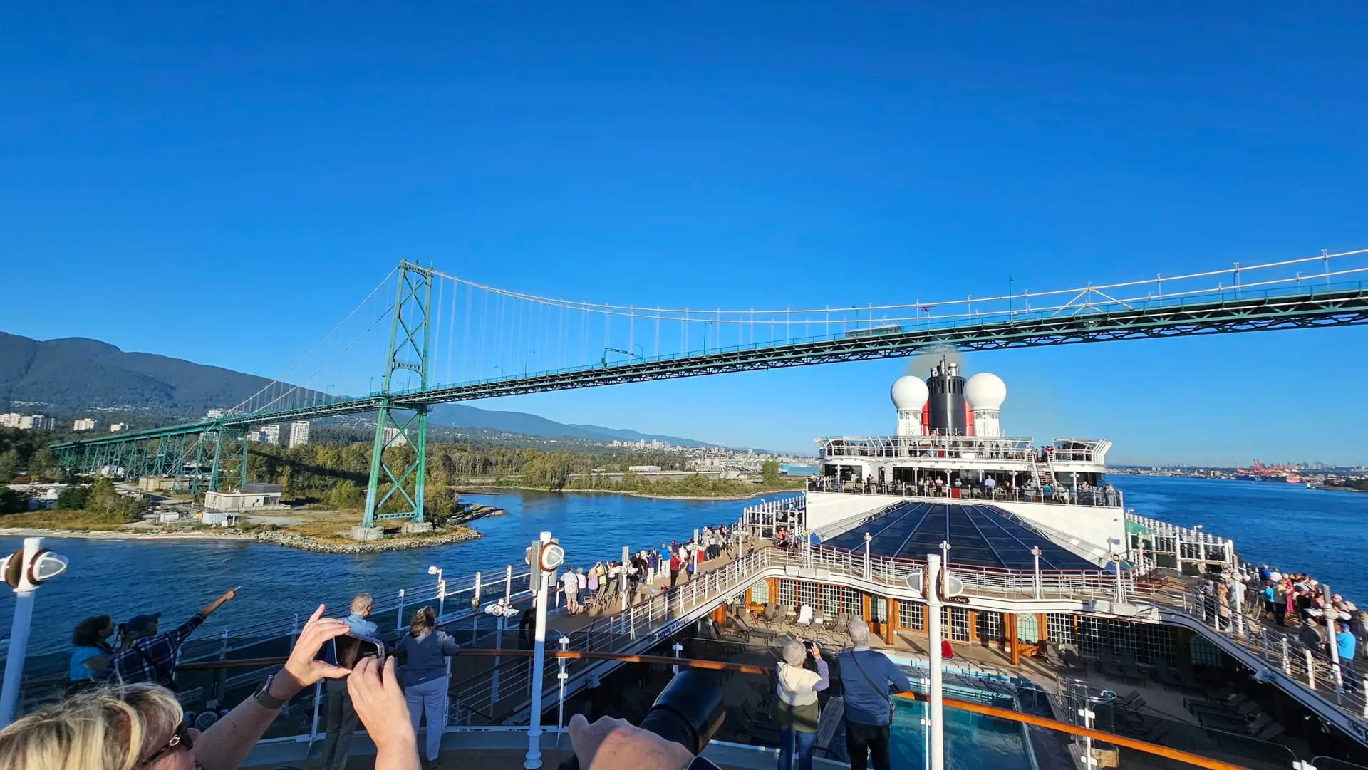 Vancouver Cruise Departure Port Guide - cruise ship going under the bridge