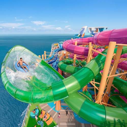 Colourful water slides on Icon of the Seas cruise ship with ocean views