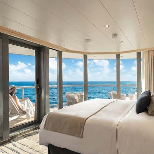 Luxury cruise ship suite with panoramic ocean views and private balcony