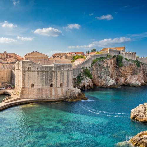 Dubrovnik old town fortress walls and turquoise Adriatic Sea