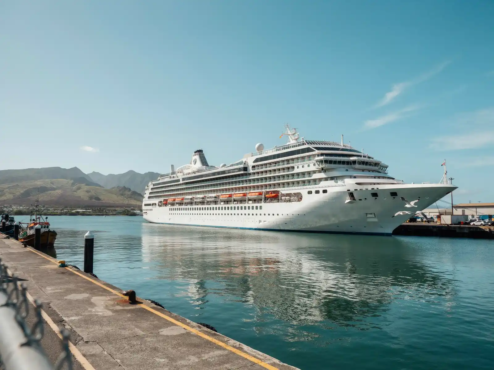 Cruise ship docked at Kahului Harbour in Maui on a sunny day