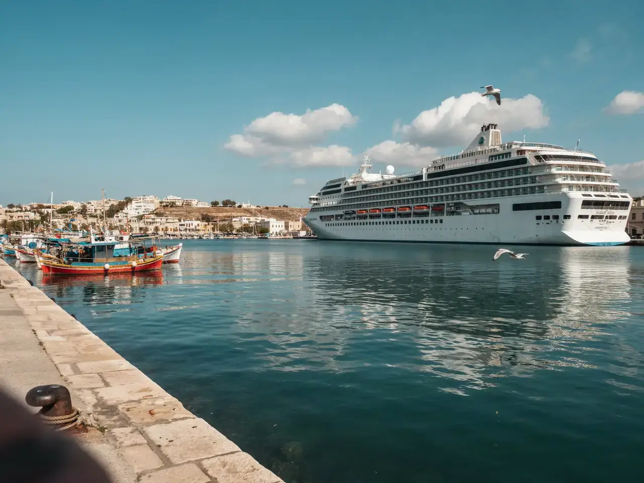 Cruise ship docked at Paphos harbour in Cyprus on a sunny day