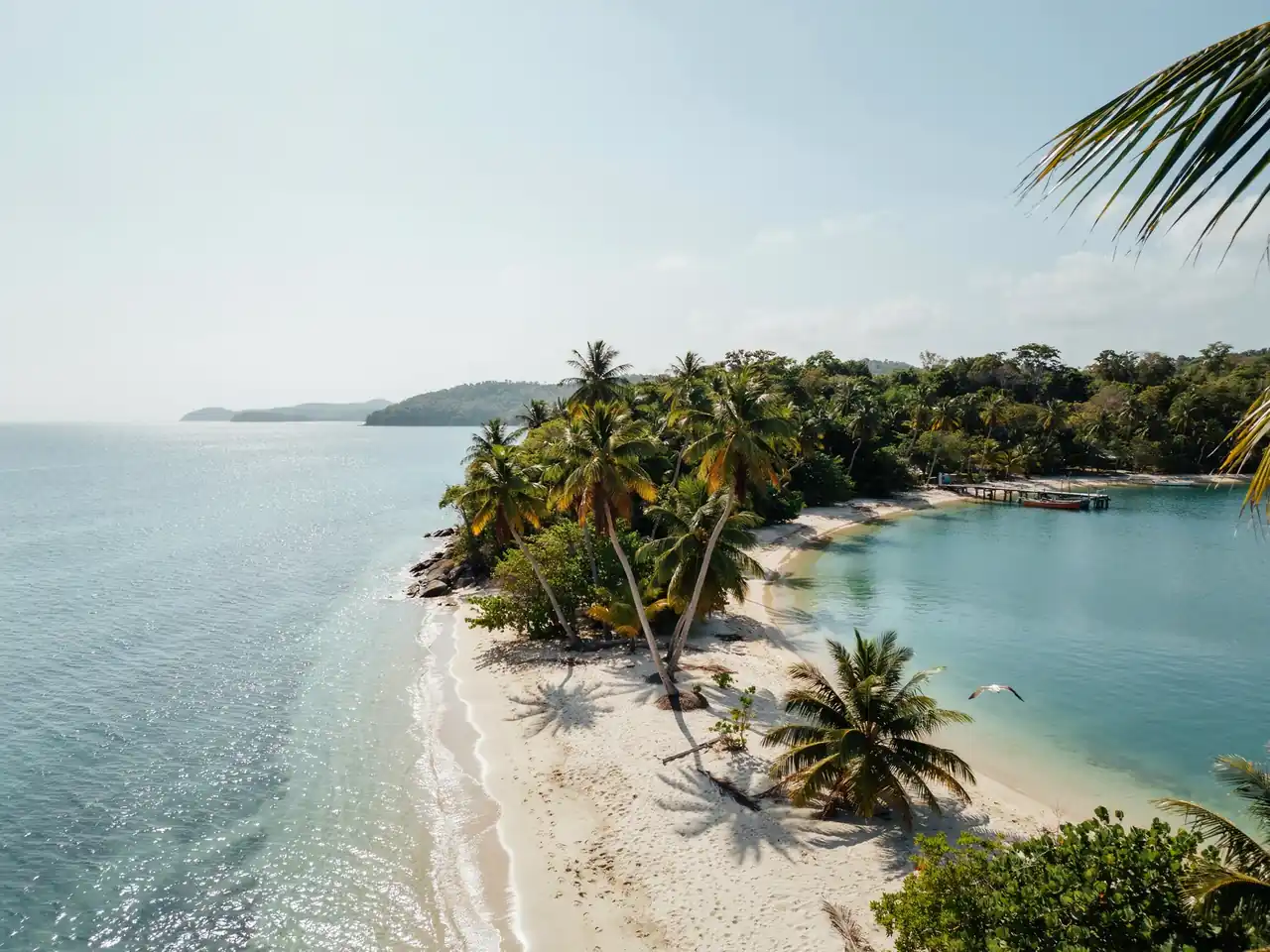 A tropical beach peninsula with turquoise water and a harbour at Labadee, Haiti