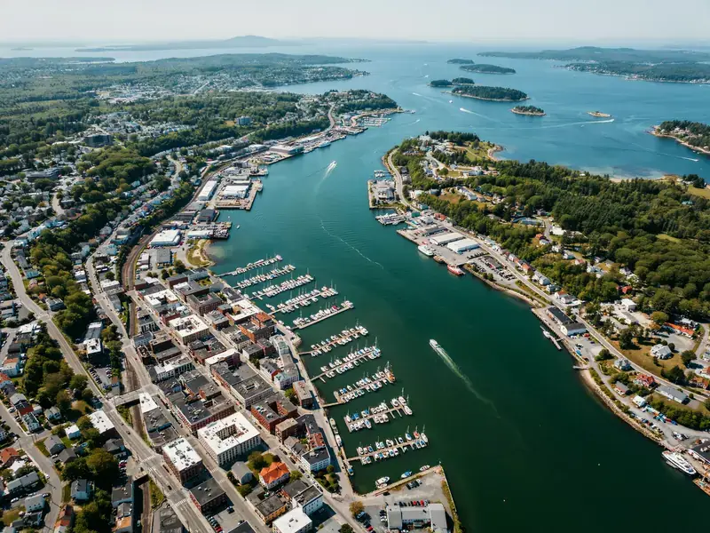 Aerial view of Portland, Maine harbour and waterfront area with docks and coastline