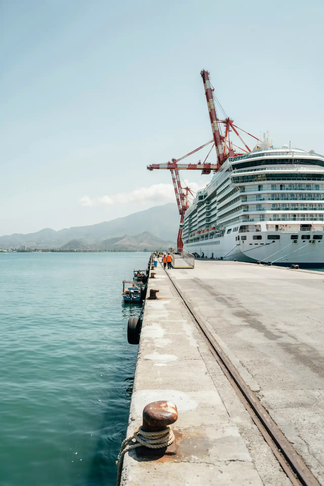 Cruise ship docked at the port of Santo Tomás de Castilla, Guatemala, on a sunny day