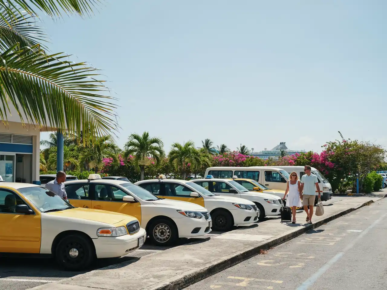 Taxis and minibuses waiting near the cruise port in Grenada on a sunny day