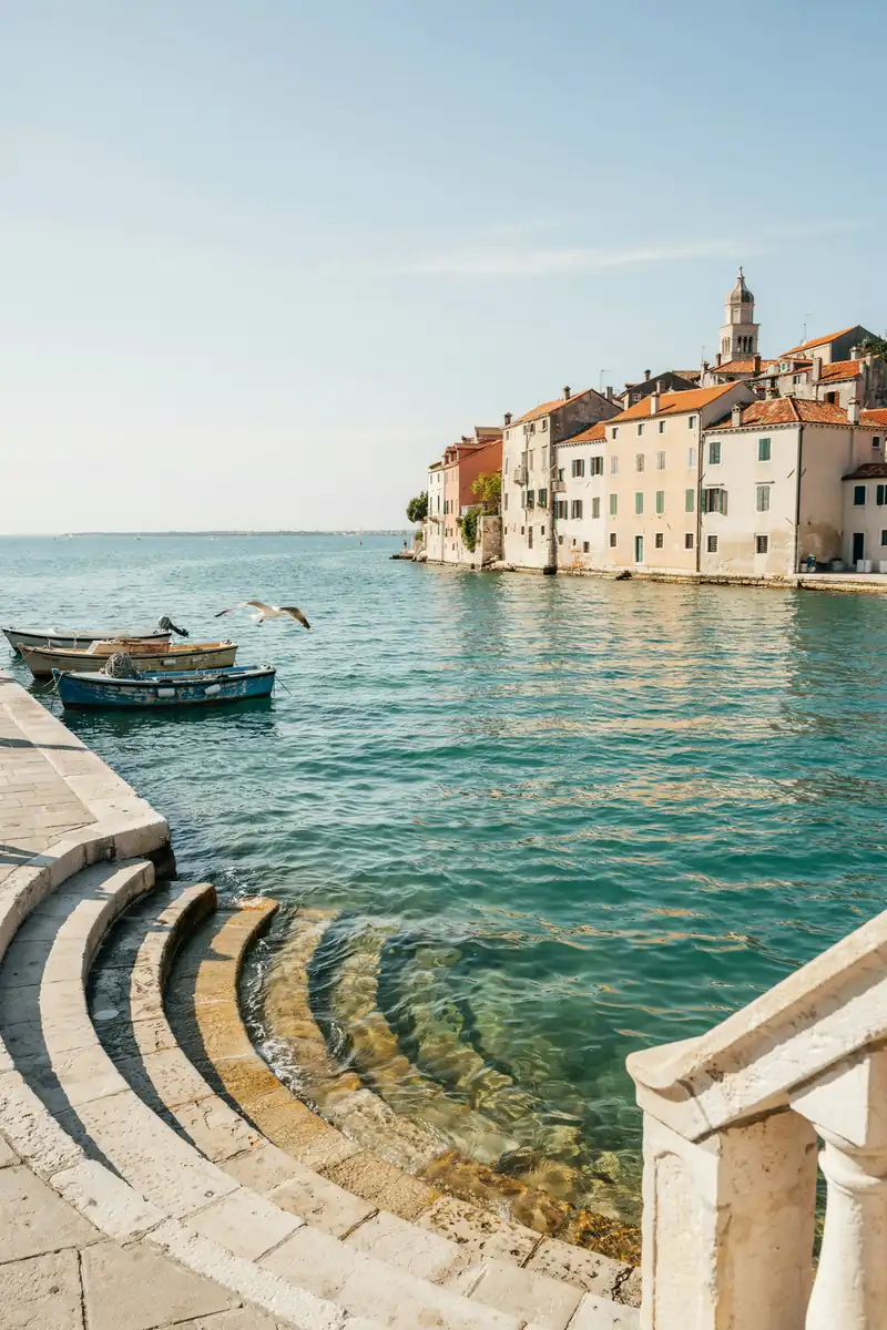Zadar old town harbour lined with stone buildings along the waterfront