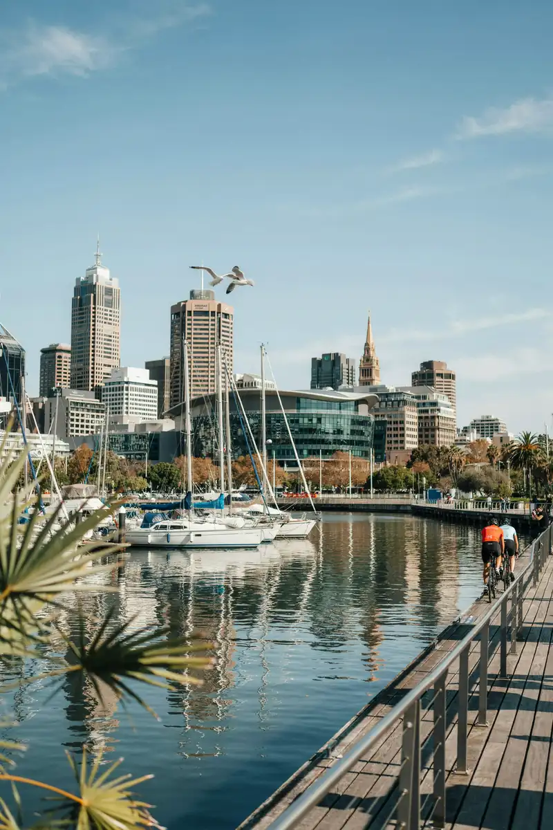 Adelaide waterfront skyline with boats moored in the harbour on a sunny day