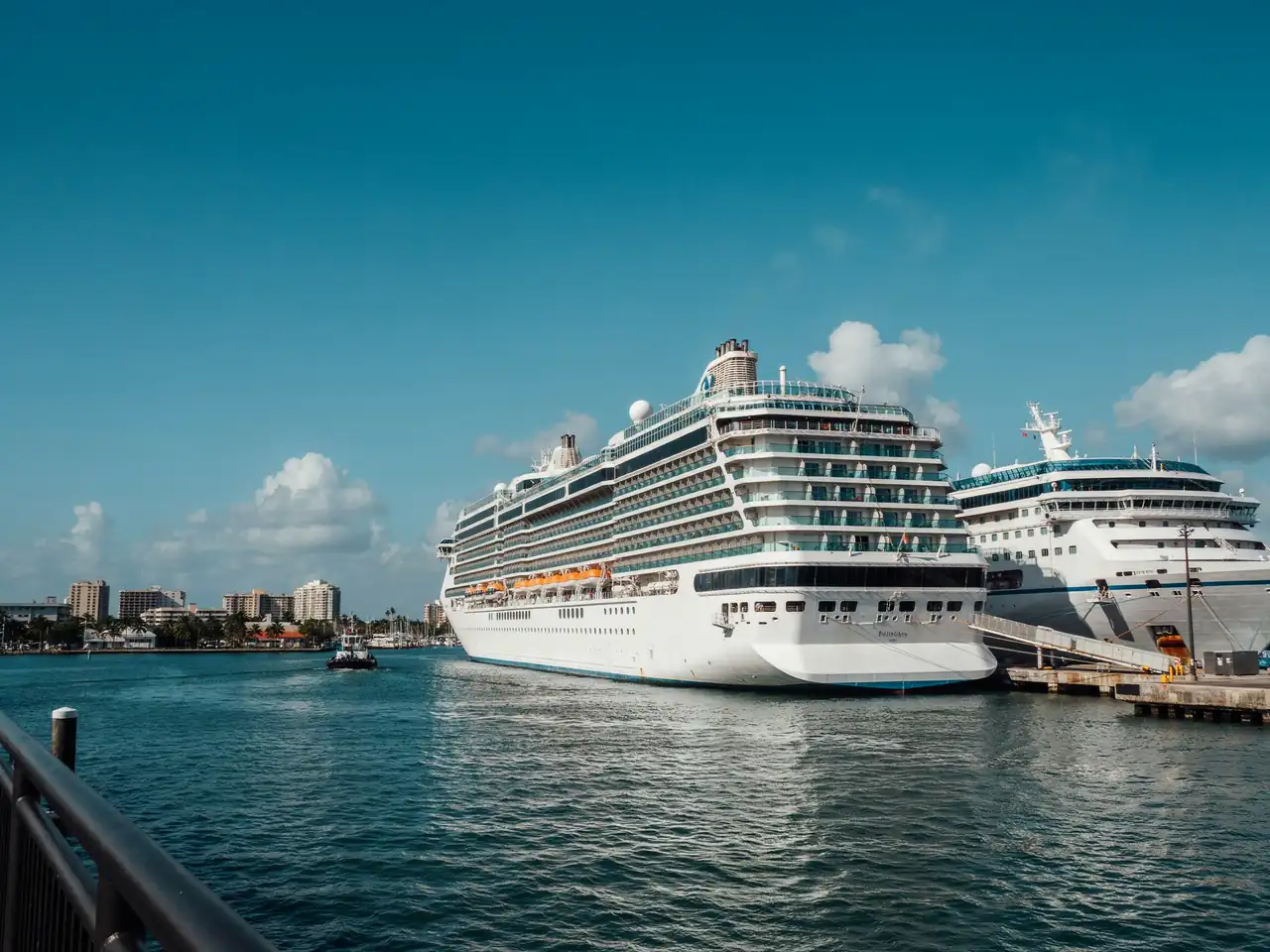 Cruise ships docked at the Fort Lauderdale port terminal on a sunny day