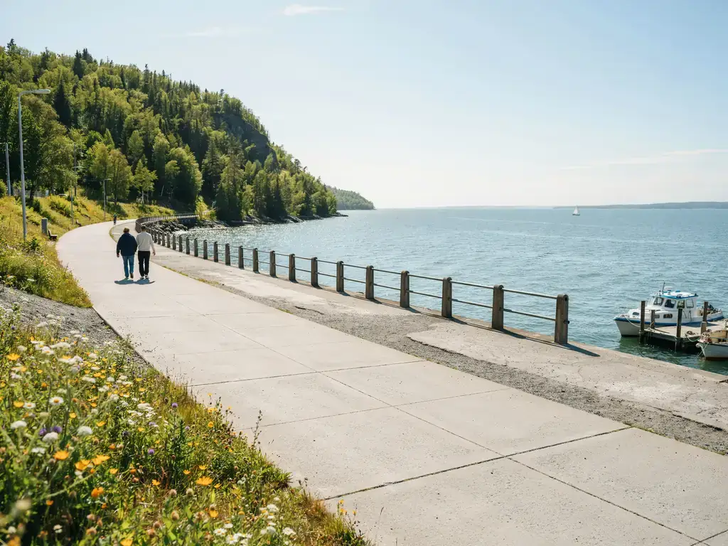 Waterfront street with walking paths near the Saguenay cruise port on a sunny day