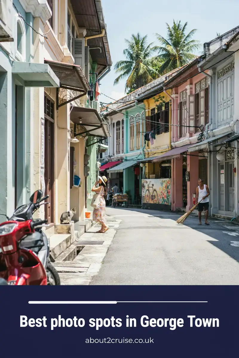 Penang cruise port: wooden stilt houses of Chew Jetty with colourful street art in George Town on a sunny day