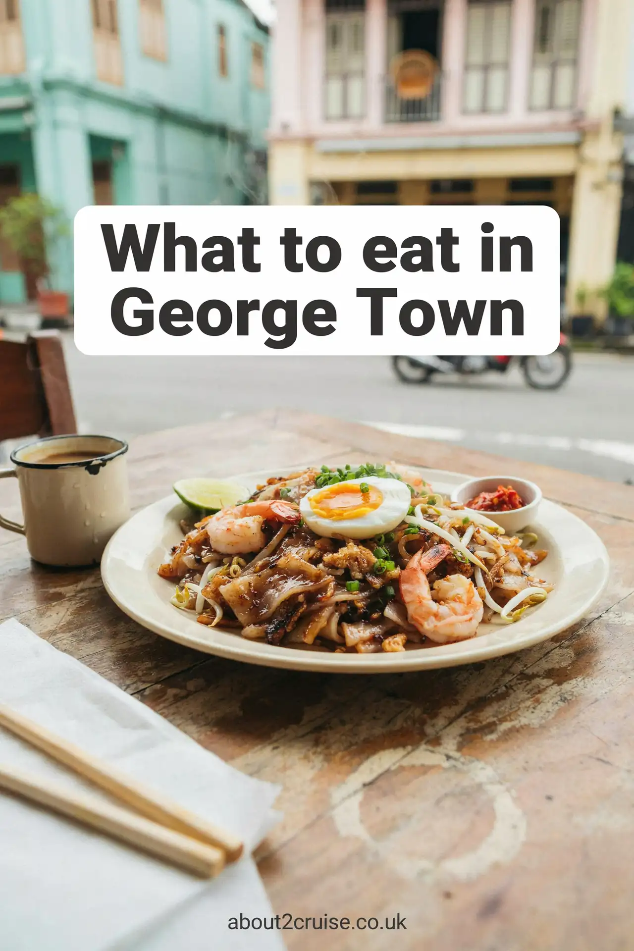 Penang cruise port: char kway teow noodle dish served at a sunny cafe table in George Town