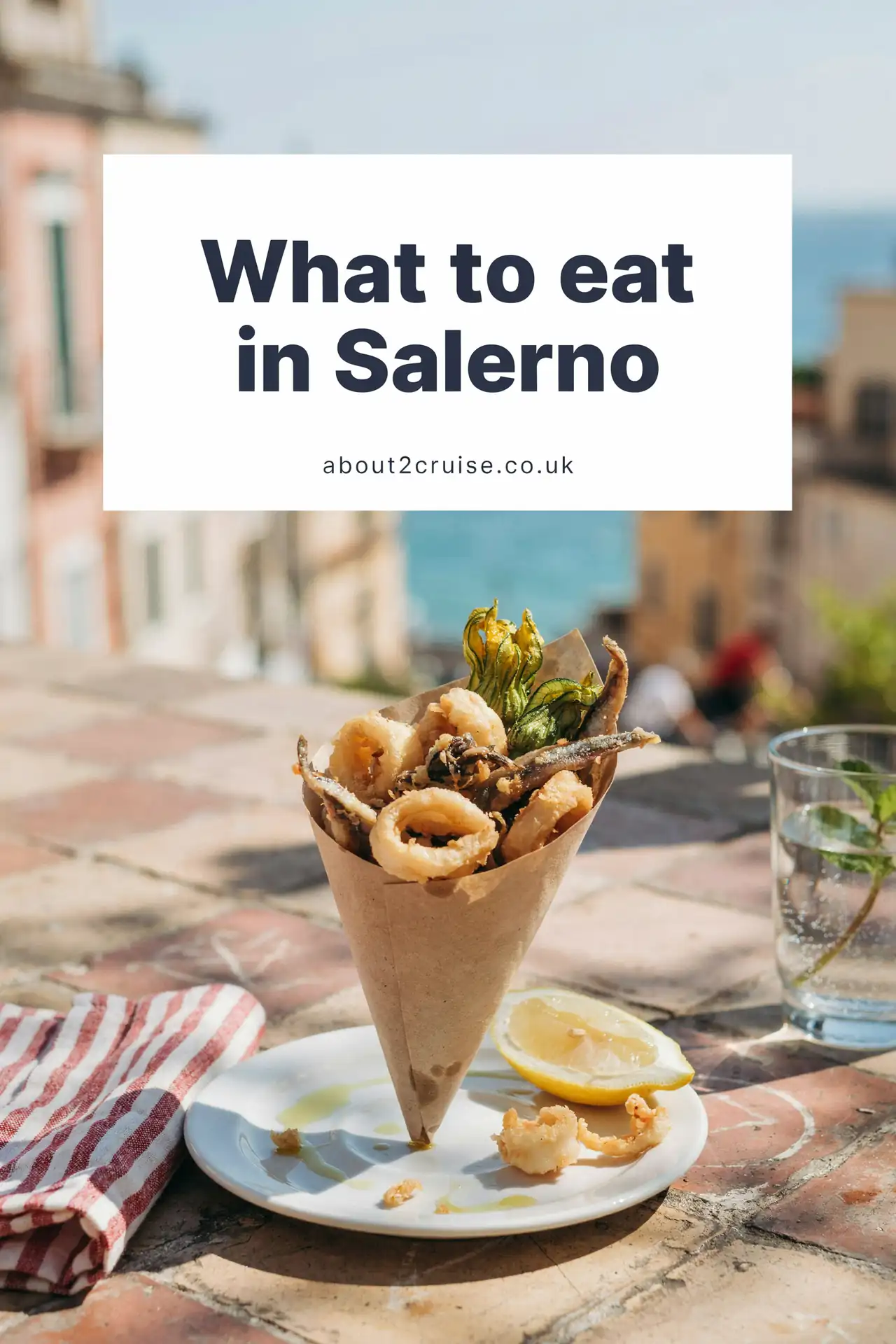 Salerno cruise port: cuoppo, a paper cone of fried anchovies, squid rings and battered vegetables, at a sunny cafe table
