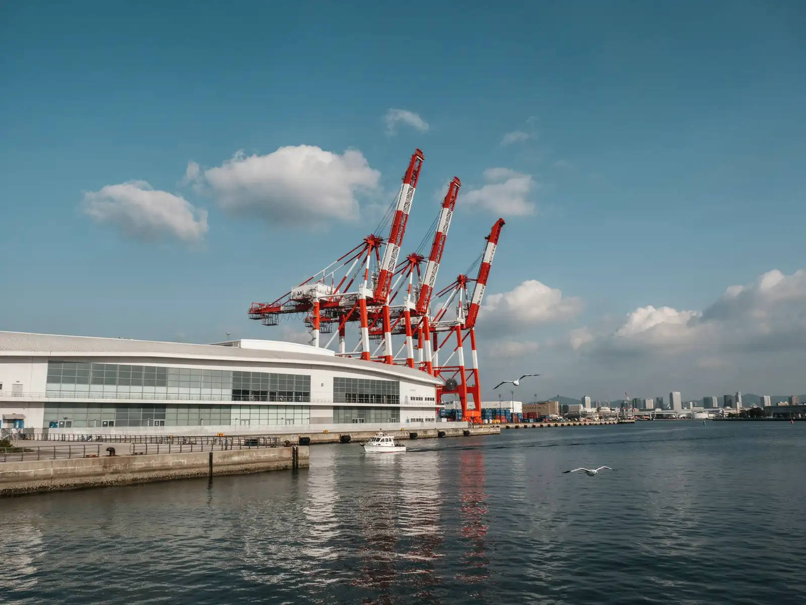 Daikoku Pier cruise terminal in Yokohama with harbour cranes in the background