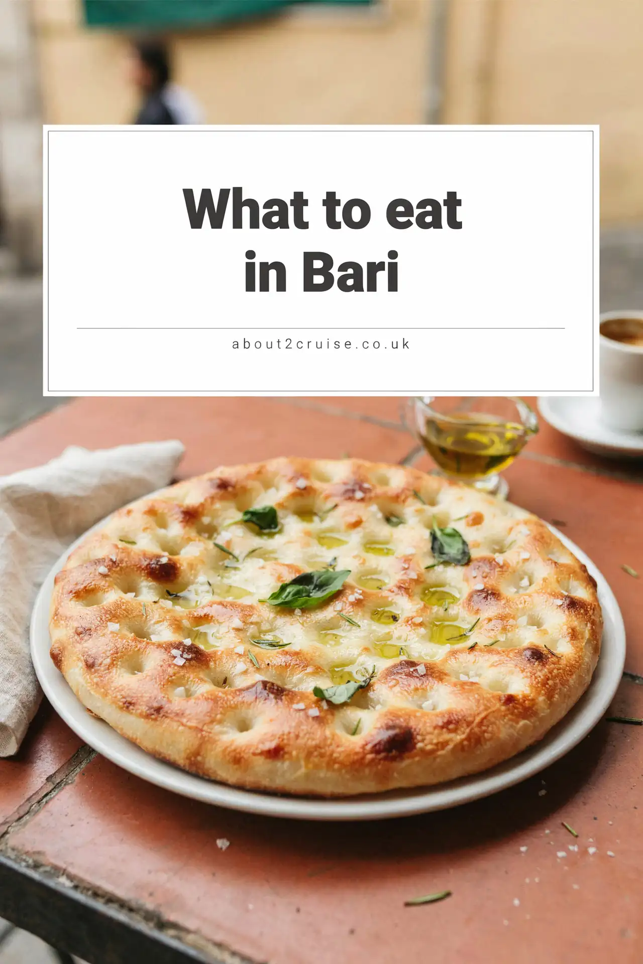 Focaccia barese, a local dish served at a sunny cafe table in Bari, Italy